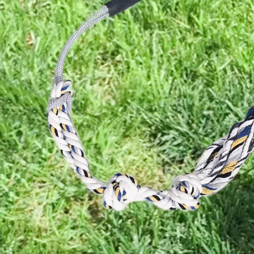 Braided cotton rope lure of the Chaselure flirt pole lying on grass
